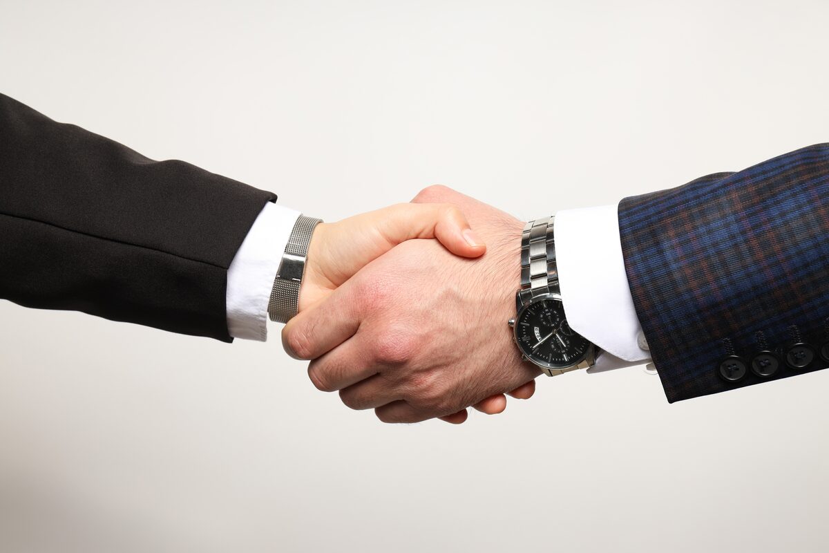 Business Angel Meeting – Handshake bei Investorentreffen